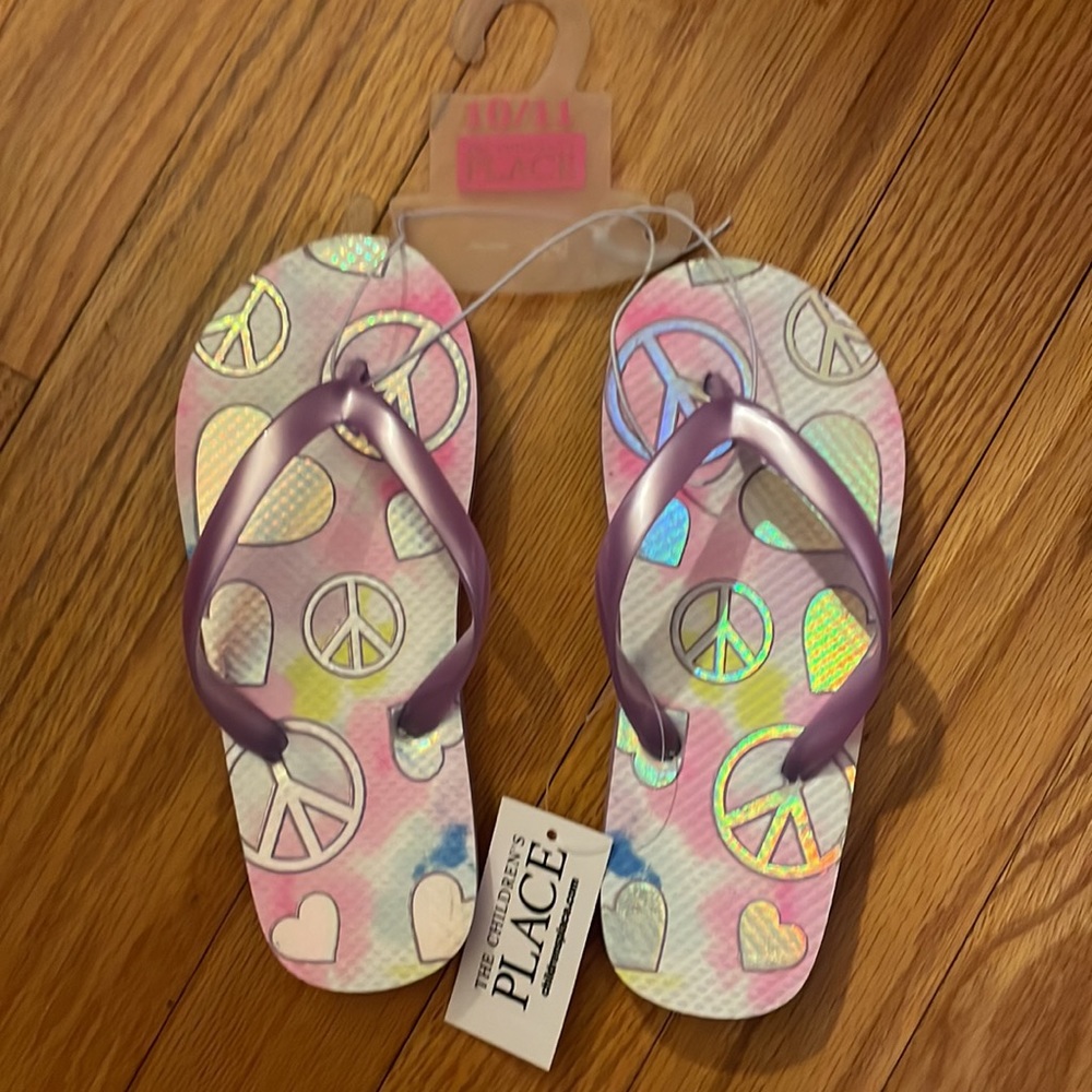 The Children Place peace sign flip flops, size  10/11, color purple